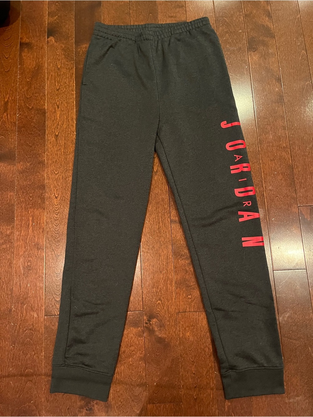Jordan Black Sweatpants with Red Side Logo